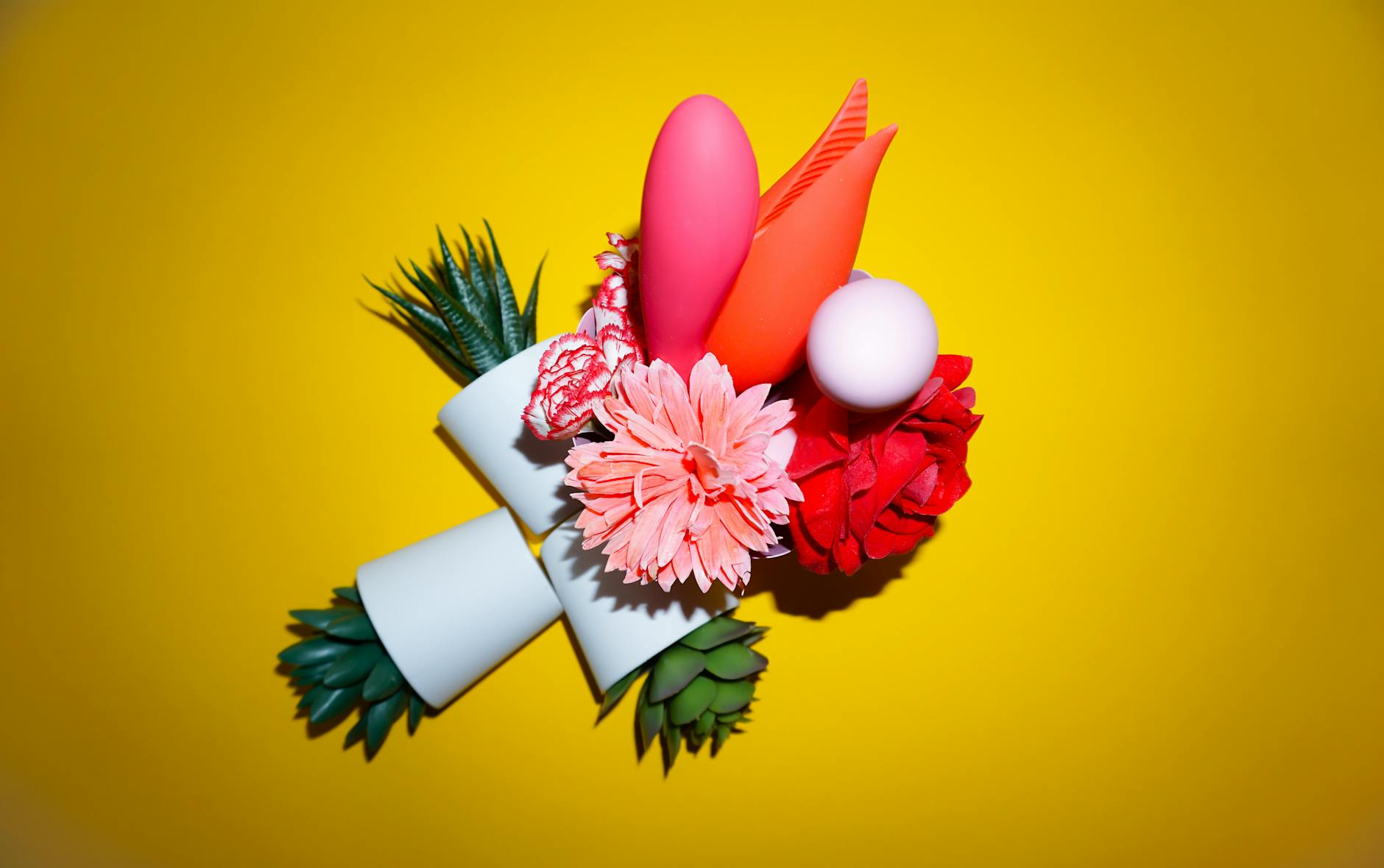Two fresh lemons held in hands, symbolizing natural wellness and the lemon vibrator design